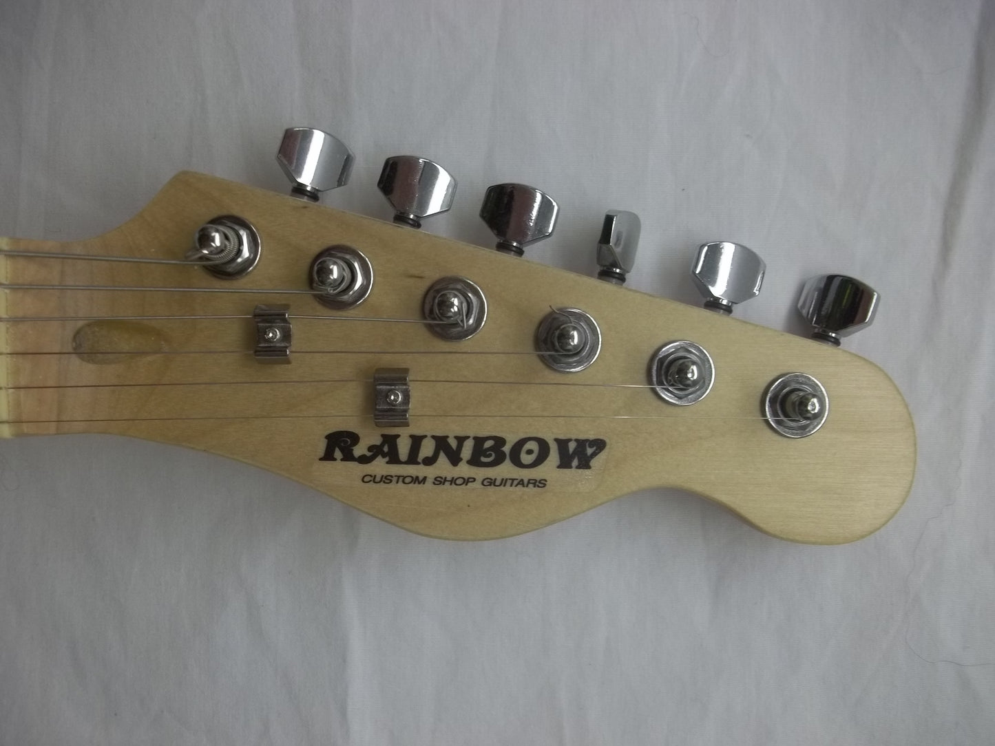 Rainbow TC electric guitar vintage white